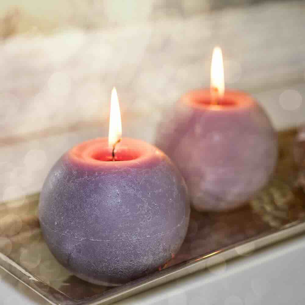 Women’s drop-in circles, sharing circles, workshops, retreats on Vancouver Island. Heart~Soul Path. A pair of round lit candles.
